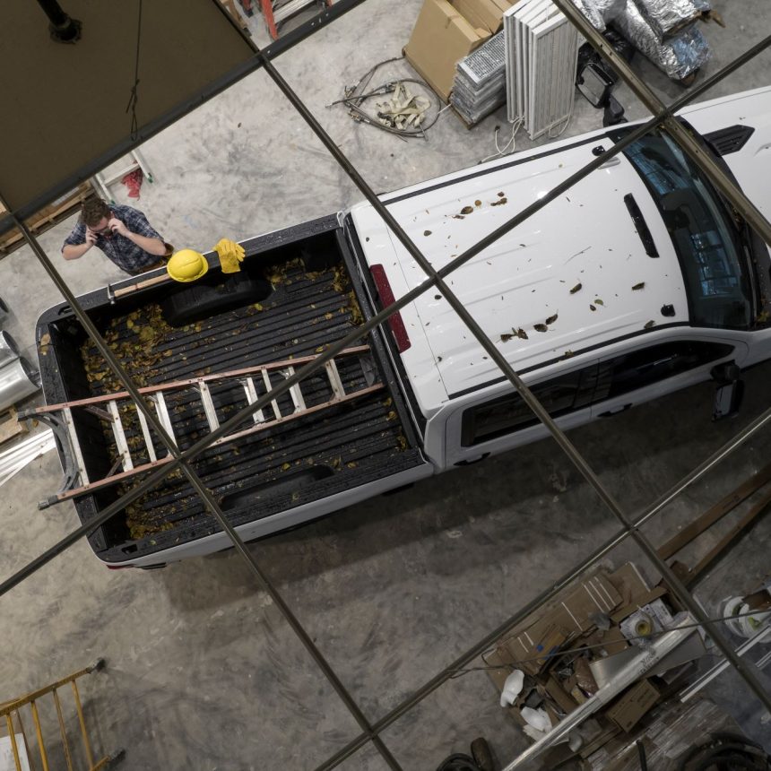 0contractor-worker-and-his-pickup-truck-on-a-site-2023-11-27-05-14-43-utc